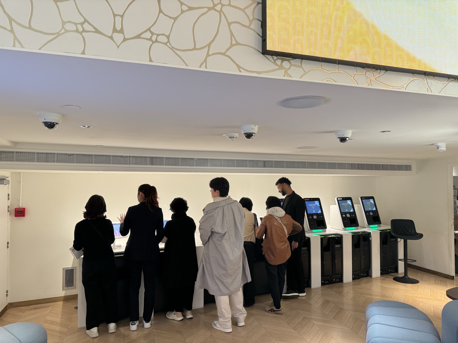 Shoppers gathered around the kiosks in the store